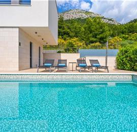 5 bedroom beachfront villa with heated pool near Omis, sleeps 9